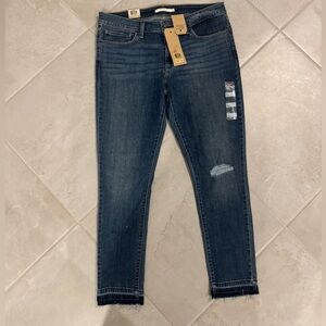Levi's Dark Blue Mid-Rise Skinny Jeans with Subtle Distress
